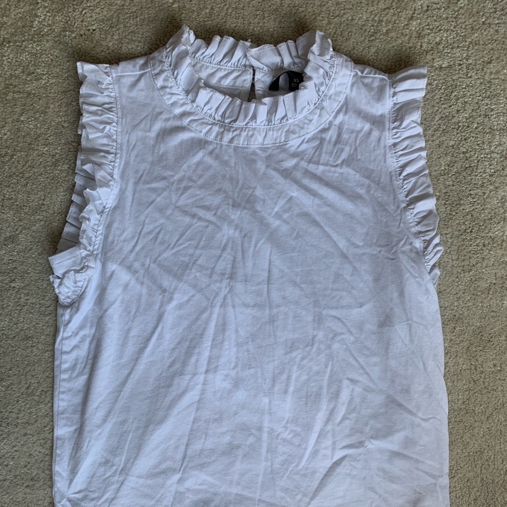 Ruffle neck and sleeve white tank top